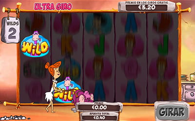 Ultra giro durante las partidas gratis con comodín Wilma en la tragaperras The Flintstones, donde Wilma vuelve los wilds aspirados en sus sitios.