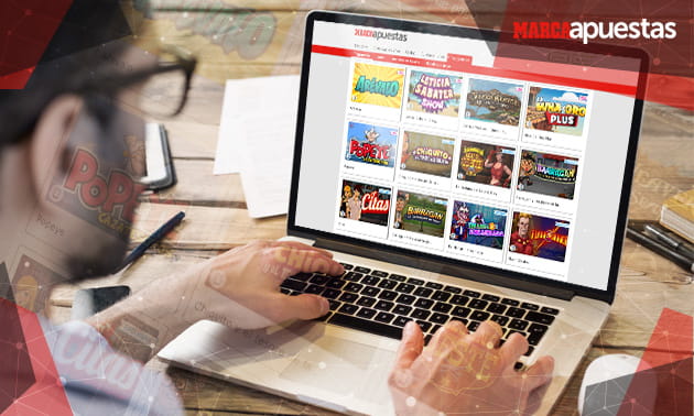 Ordenador portátil con la página web de Marca Apuestas en la pantalla