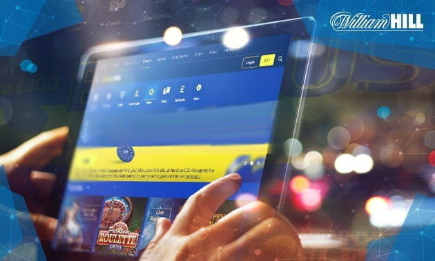 Ordenador portátil con la página web de William Hill en la pantalla