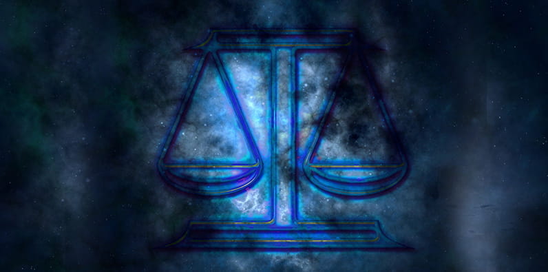 El símbolo de la balanza en un fondo de cielo nocturno